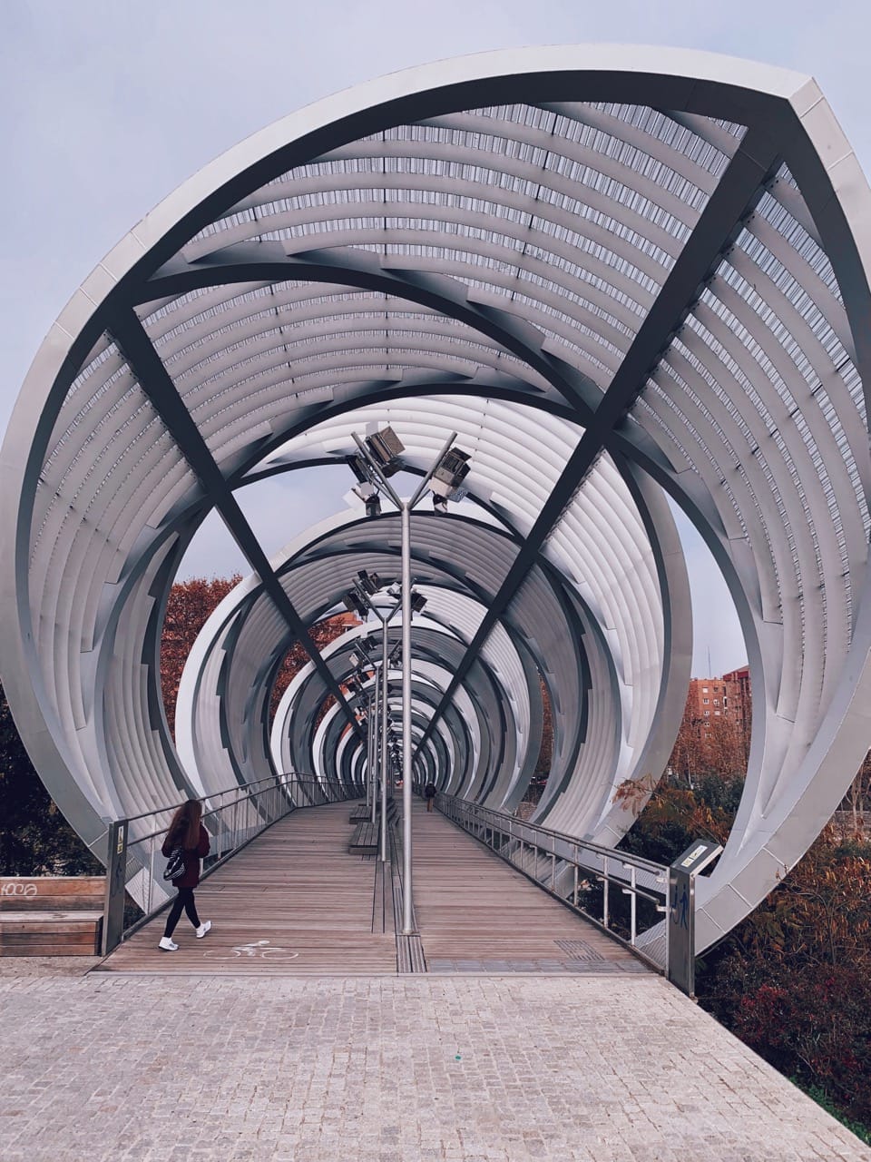 walking geometric bridge in madrid